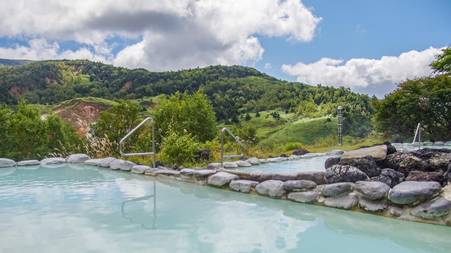 雄大な山々を望む絶景露天風呂「こまくさの湯」