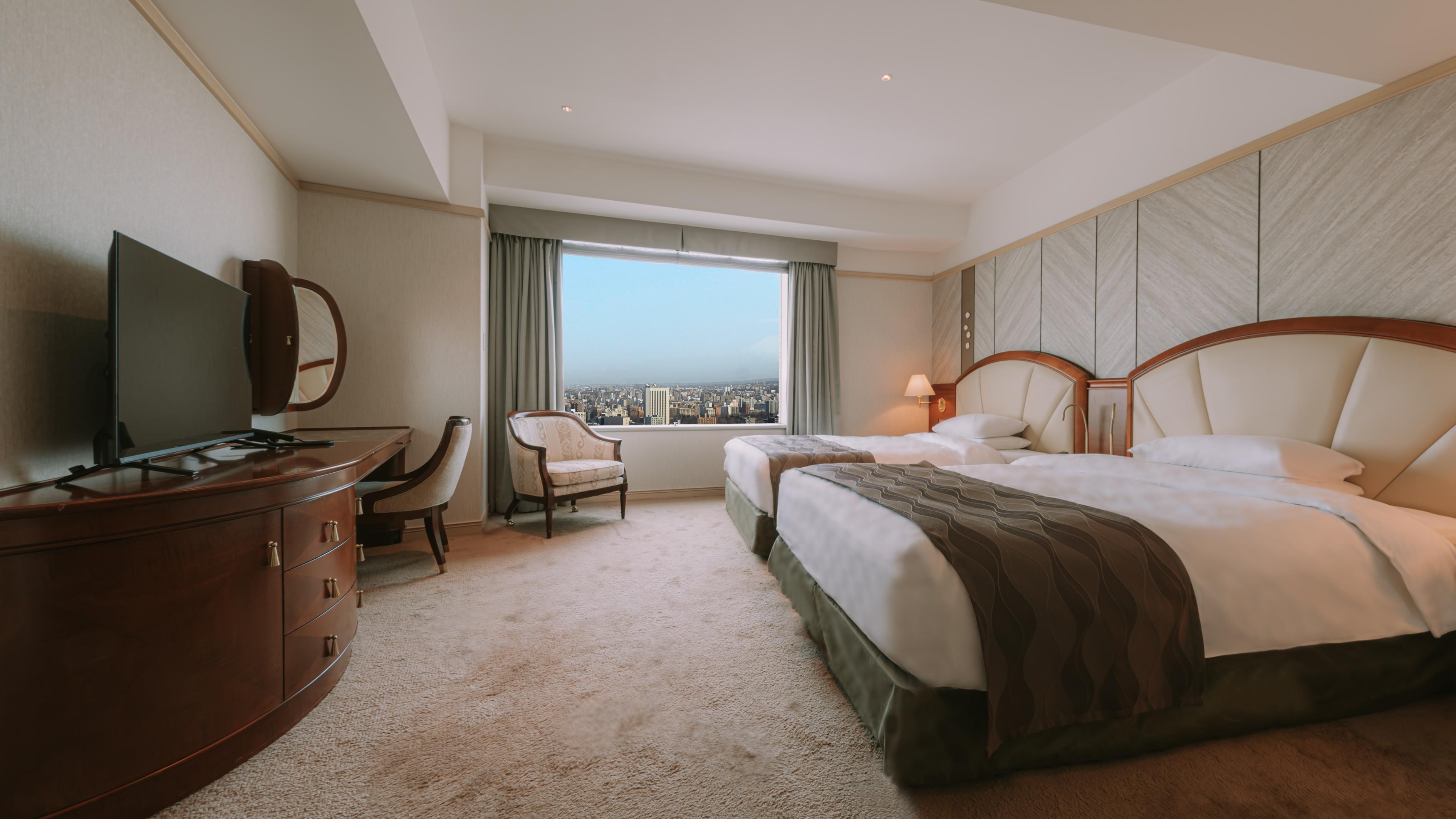 クラブロイヤルスイートルーム（105㎡）は、リビングルームのソファベッドを使用し最大6名さまでご宿泊可能。