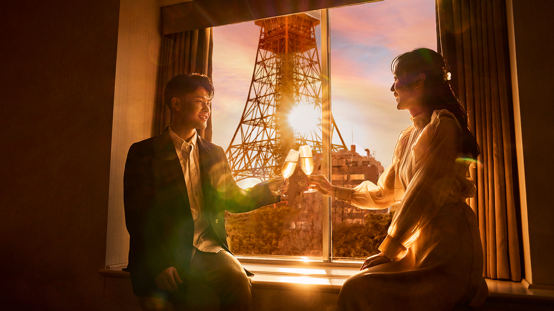 シャンパンを片手に乾杯