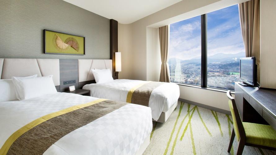 【客室一例】EIZANフロアスイートツイン＜33・35F＞：ベッドルーム