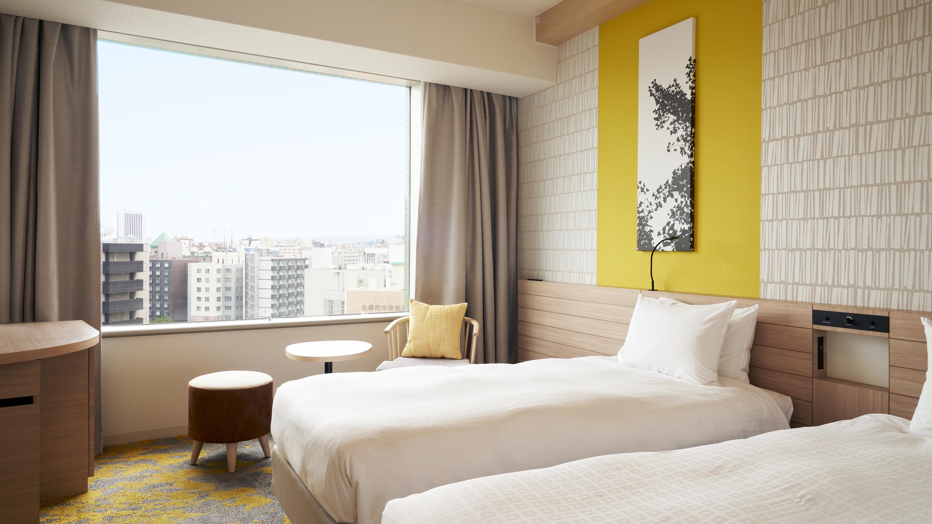 ＜5～12F＞スタンダードツインルームは、北海道の銀杏並木をイメージしたお部屋です。